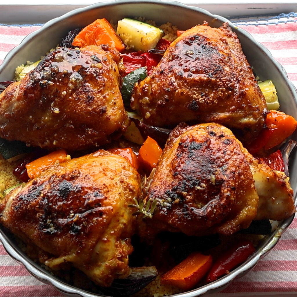 Fluffy Couscous with roasted vegetables and golden chicken laps.
