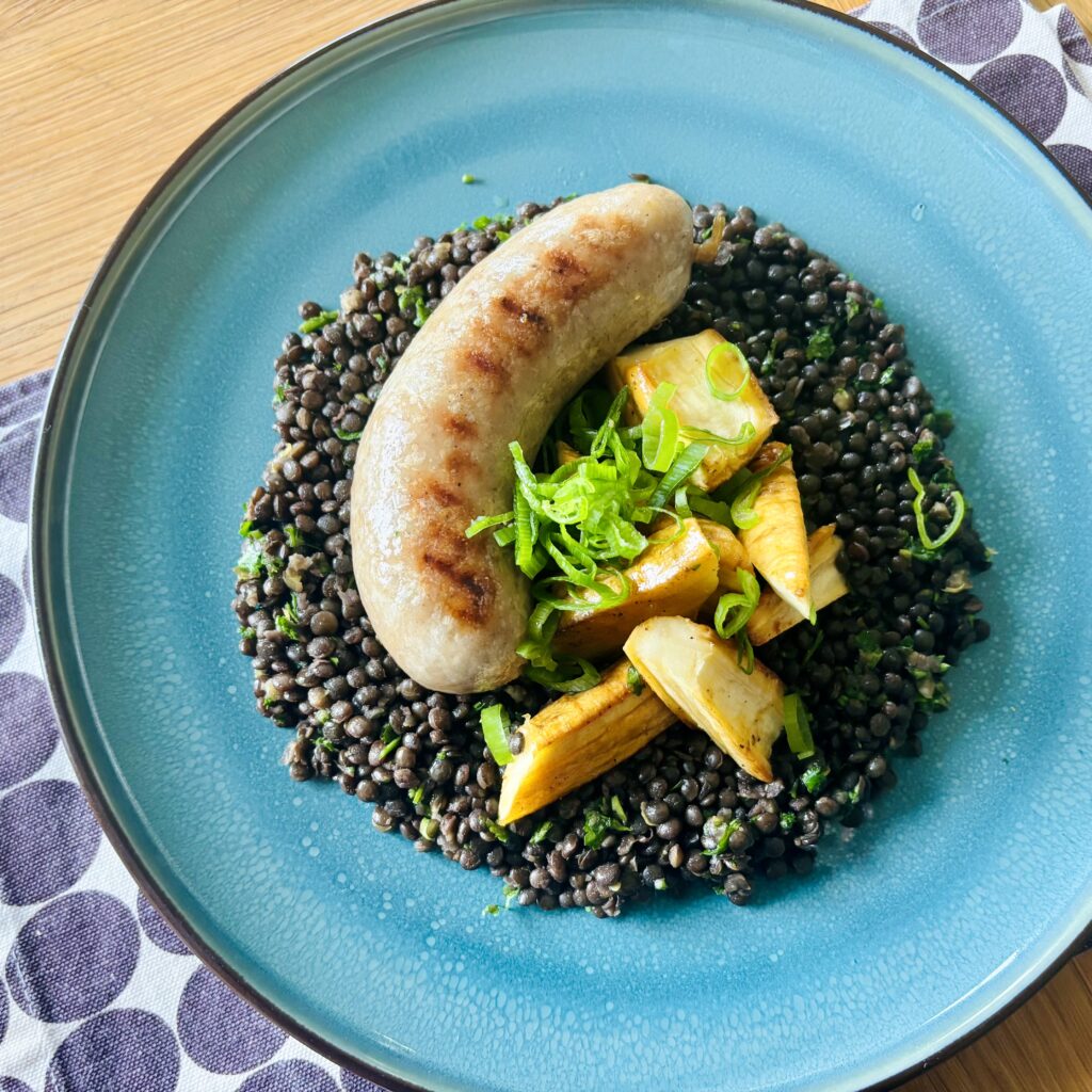 Harmony Bowl made with Beluga lentils, and Grilled Sausage.